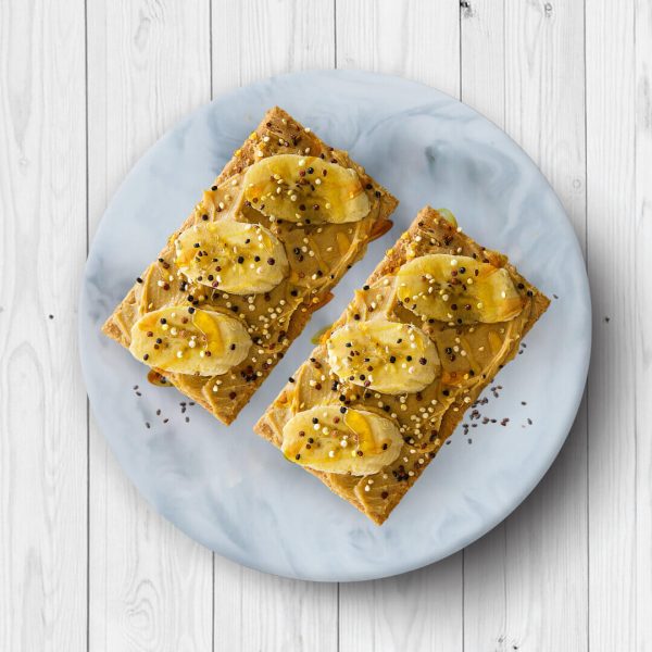 healthy and delicious Tosh cracker with banana and honey
