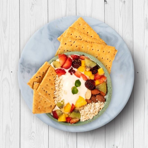 healthy and delicious Tosh cracker with fruits bowl